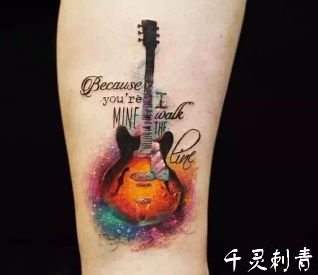 手臂吉他纹身手稿图案